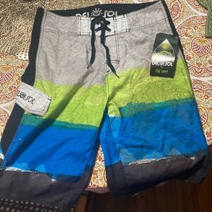 Cute Men’s Del Sol High tide swim suit trunks brand new with tags size 34M